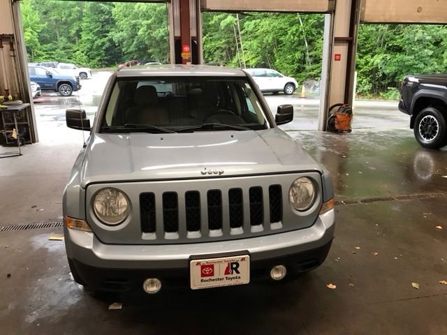 Used 2013 Beige Jeep Sport image 1