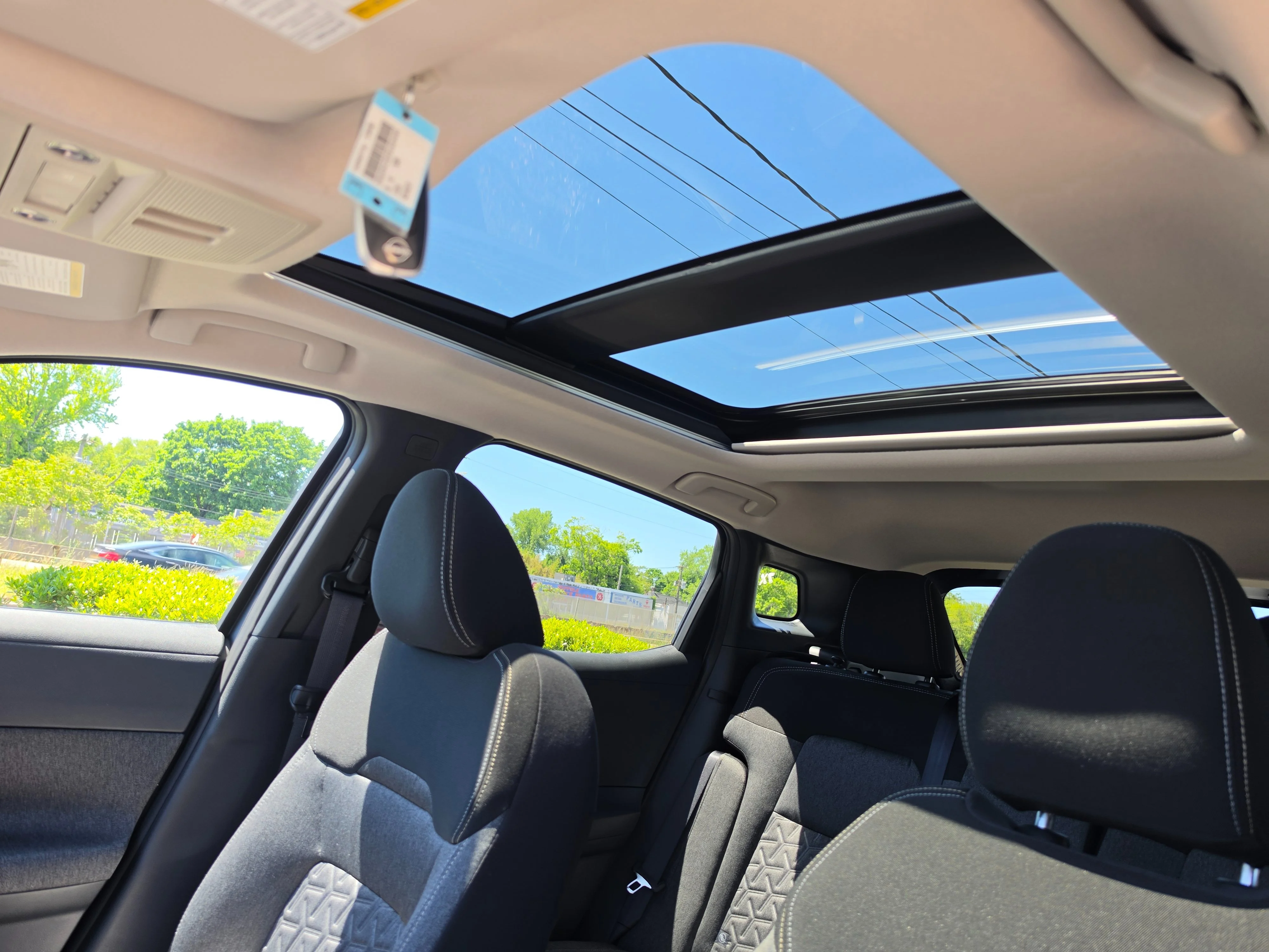 New 2026 Aspen White Tricoat/Super Black Nissan SV image 13
