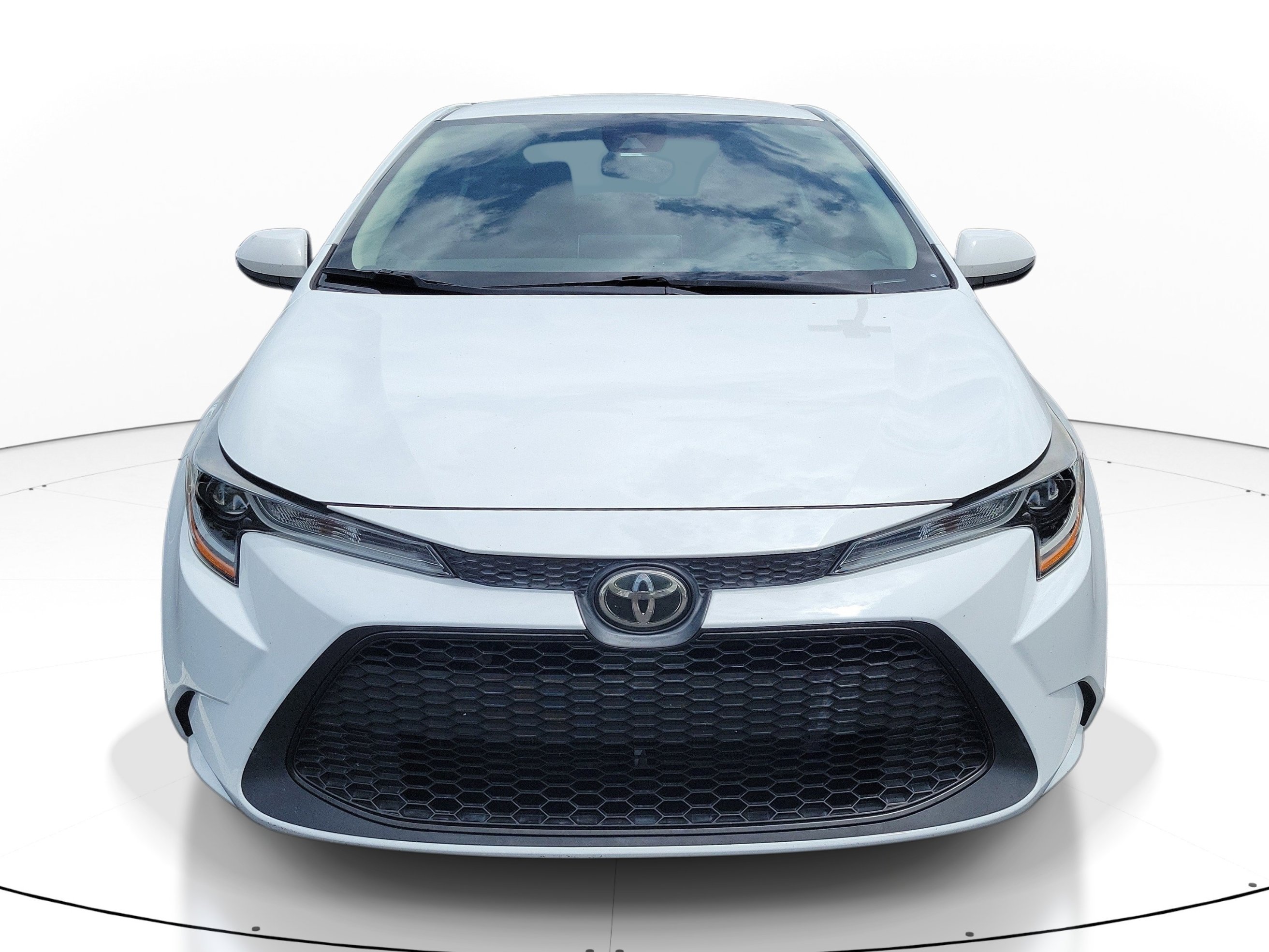 Used 2020 Super White Toyota LE image 1