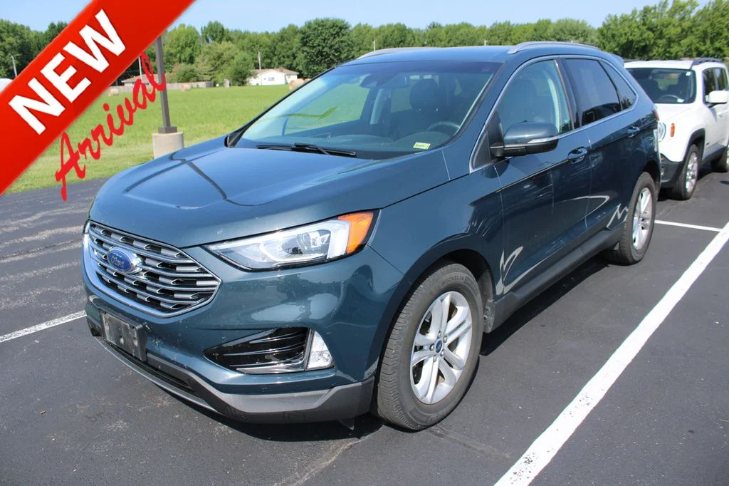 Used 2019 Sea Green Ford SEL image 1