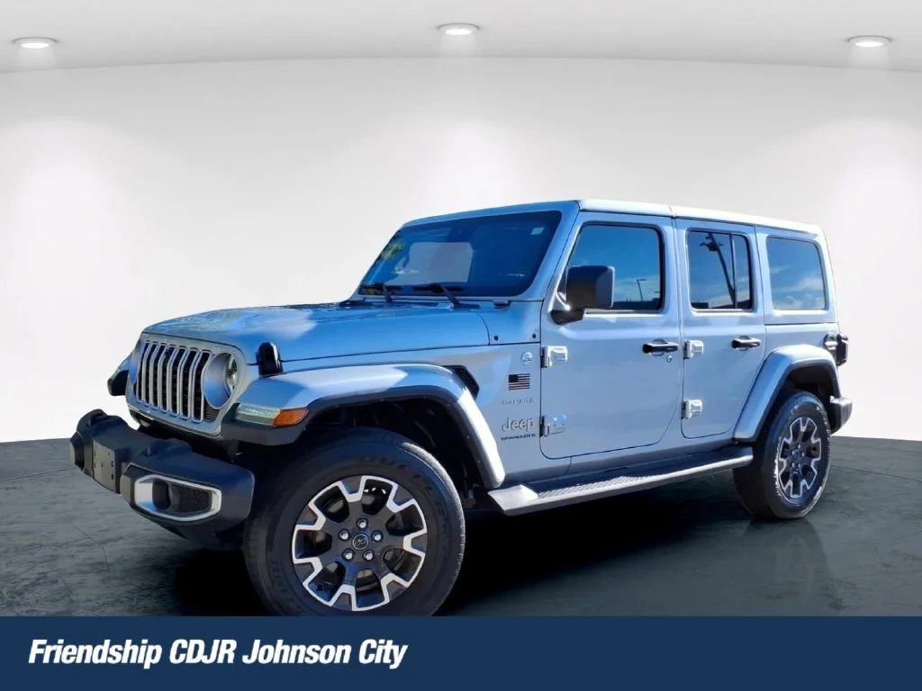 Used 2024 Silver Jeep Sahara image 1