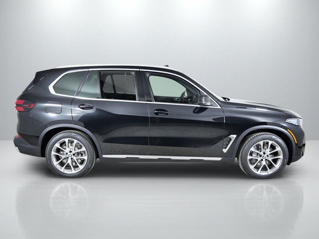 Used 2026 Black Sapphire Metallic BMW xDrive50e image 9
