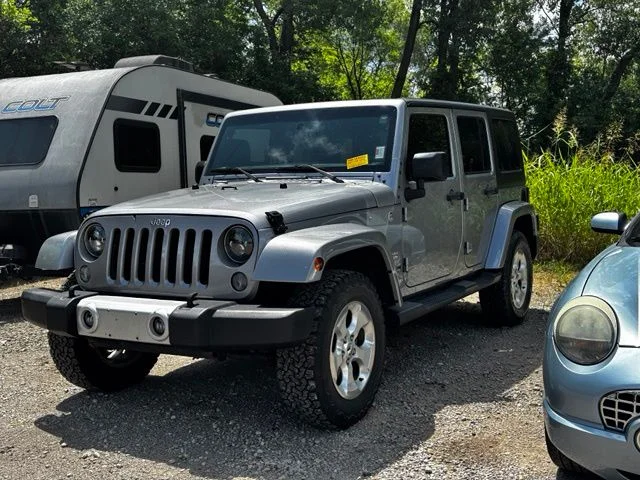 Used 2015 Silver Jeep Unlimited Sahara image 3