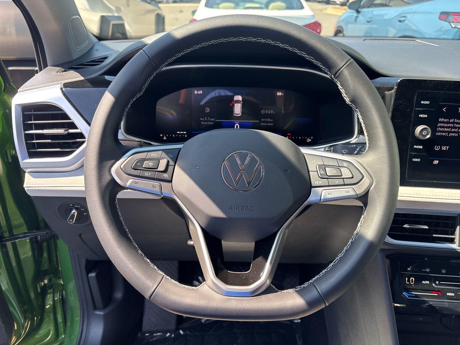 New 2026 Bright Moss Green Metallic Volkswagen SE image 18