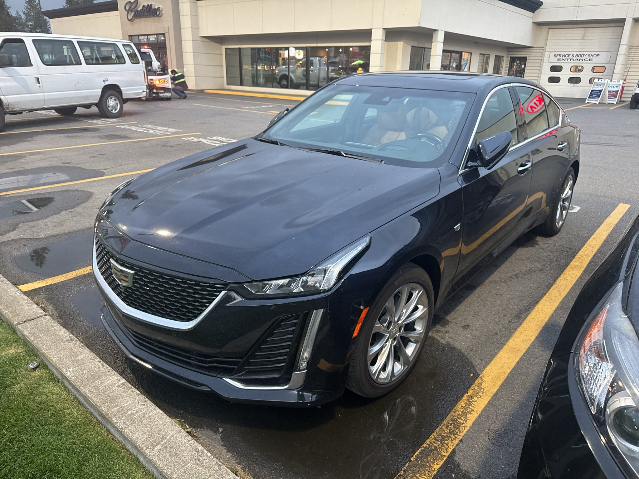 Used 2021 DARK MOON BLUE METALLIC Cadillac Premium Luxury image 1