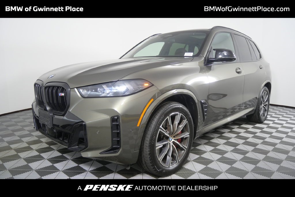 Certified Used 2026 Green Metallic BMW M60i image 1