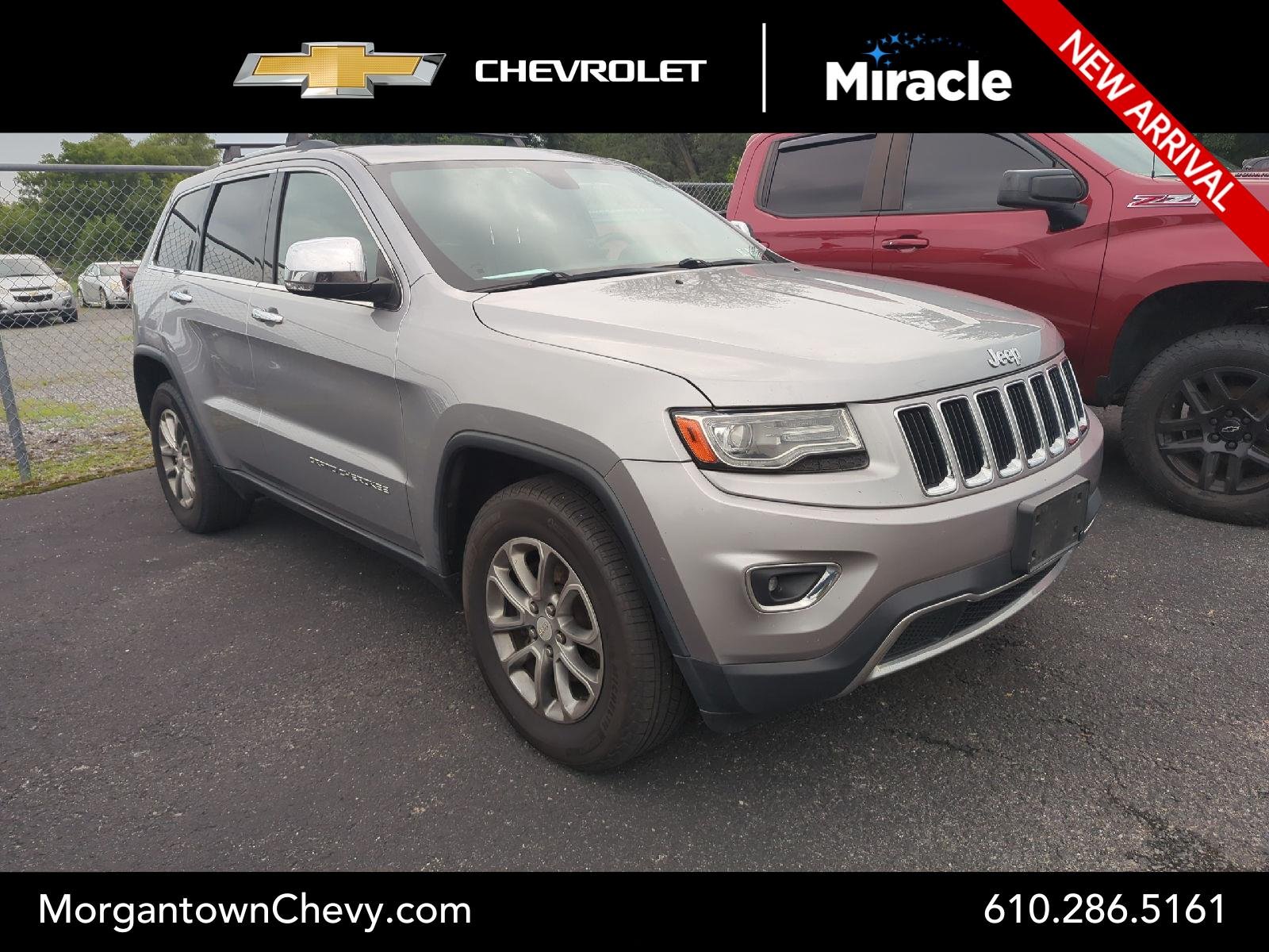 Used 2014 Billet Silver Metallic Clearcoat Jeep Limited image 1