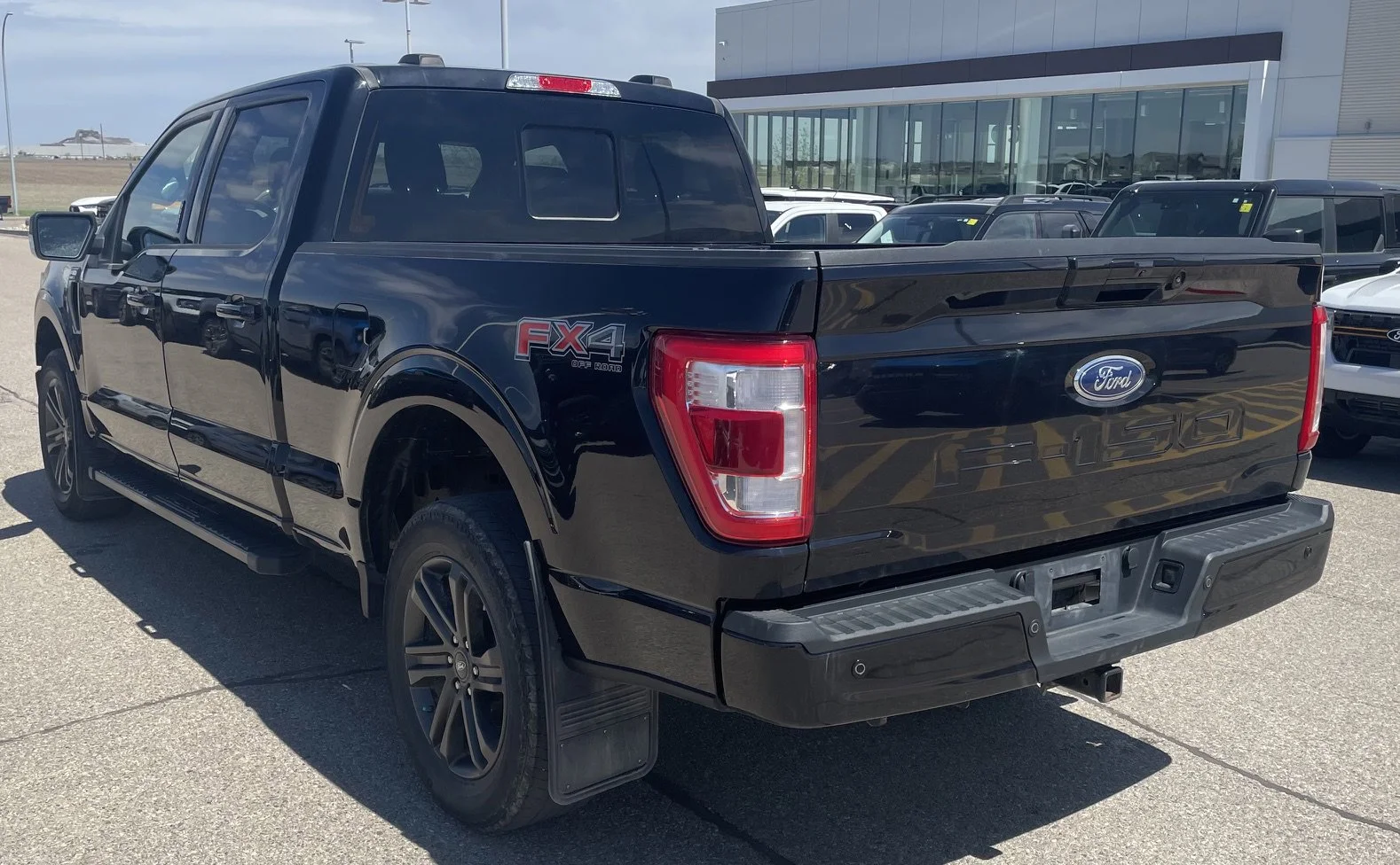 Used 2022 Black Ford LARIAT SuperCrew image 3