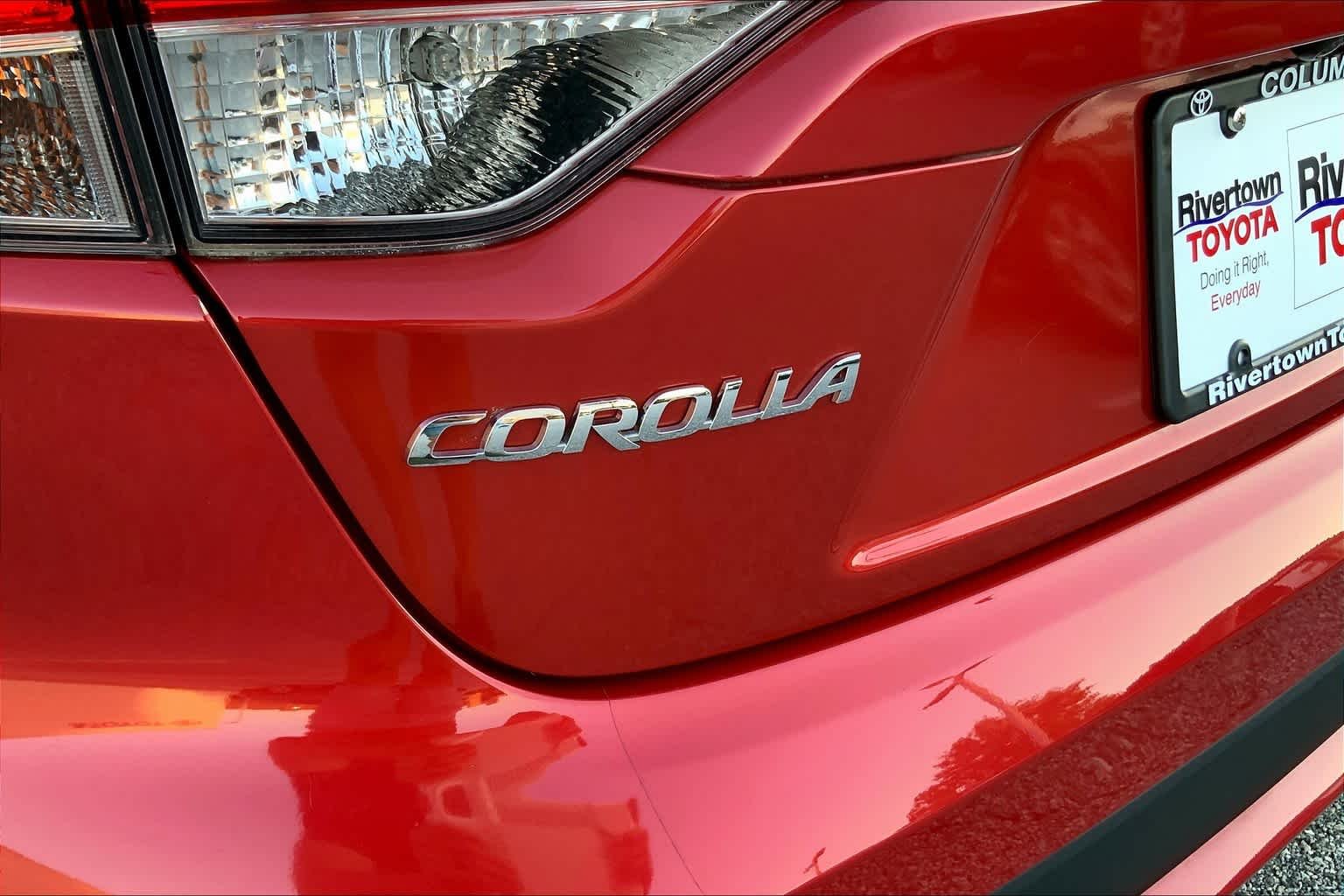 Used 2020 Barcelona Red Metallic Toyota LE image 33