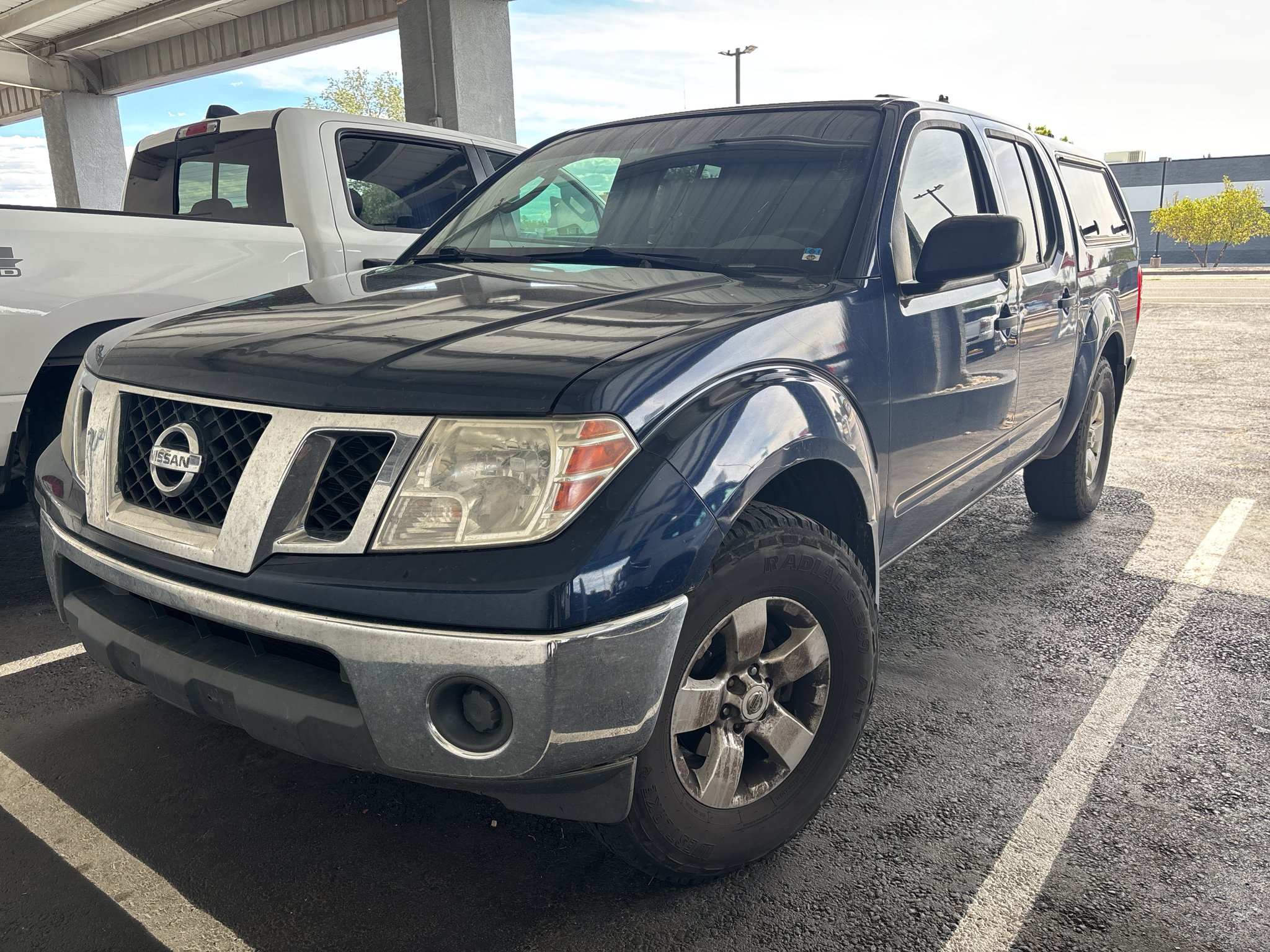 Used 2011 Navy Blue Nissan SV image 1