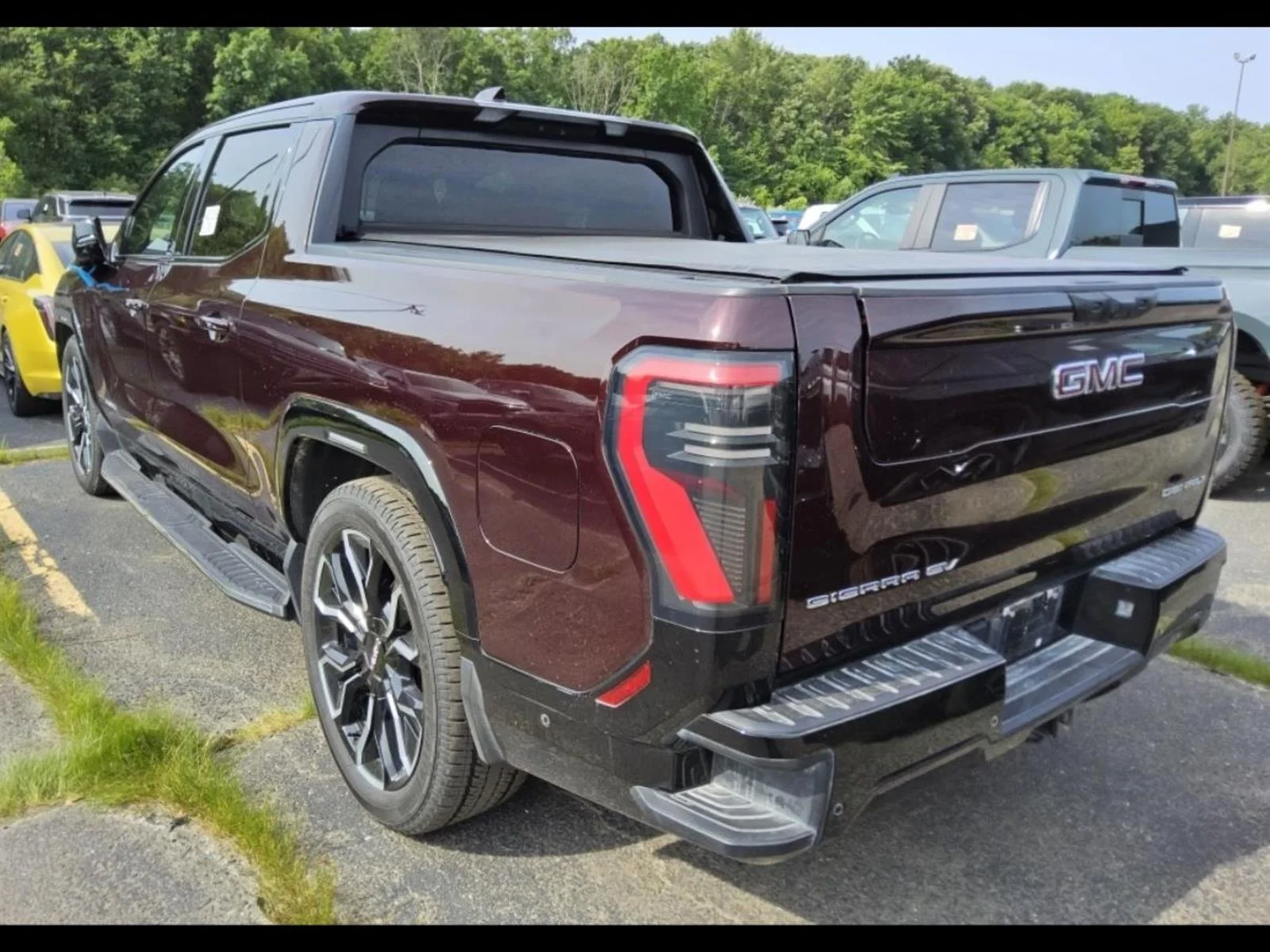 Used 2026 Dark Ember Metallic GMC Denali Max Range image 4