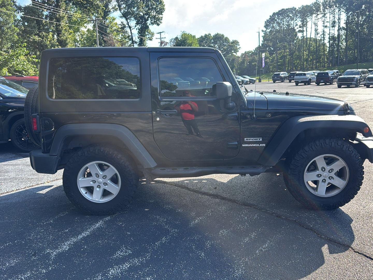 Used 2016 Black Clearcoat Jeep Sport image 2