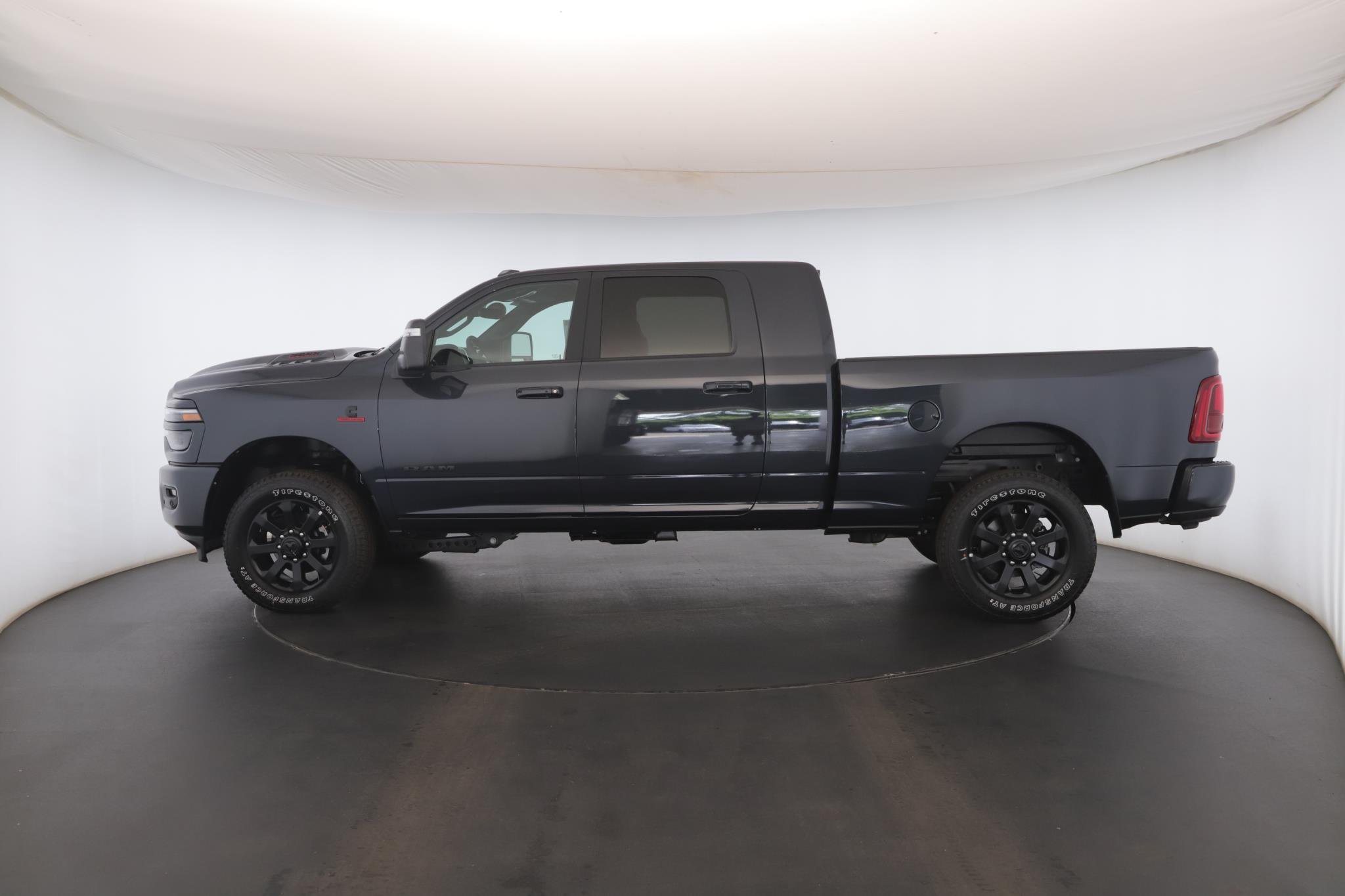 Used 2026 Forged Blue Metallic Ram Laramie 4x4 Mega Cab 6