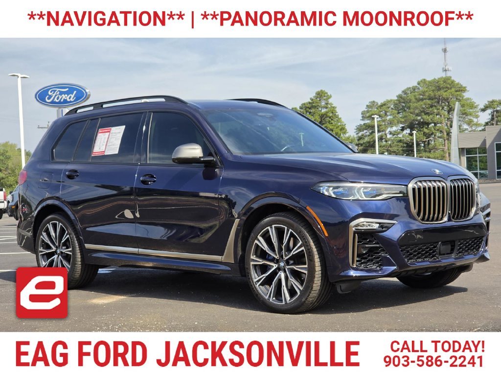 Used 2022 Tanzanite Blue II Metallic BMW M50i image 1