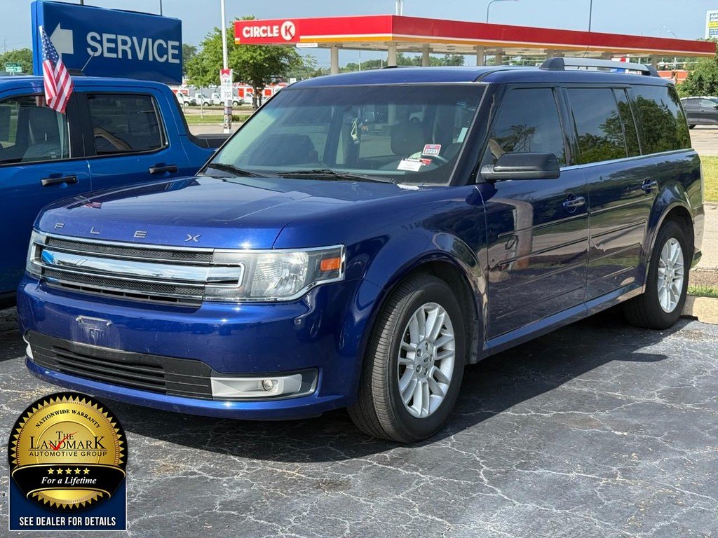 Used 2014 Deep Impact Blue Metallic Ford 4dr SEL AWD image 2