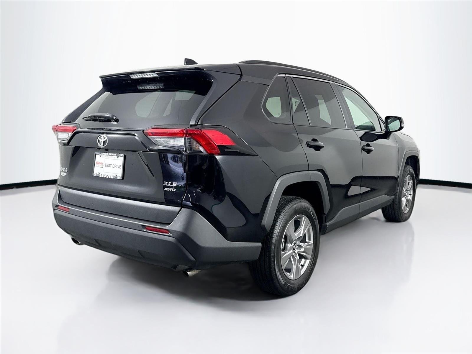Certified Used 2025 Midnight Black Metallic Toyota XLE image 2