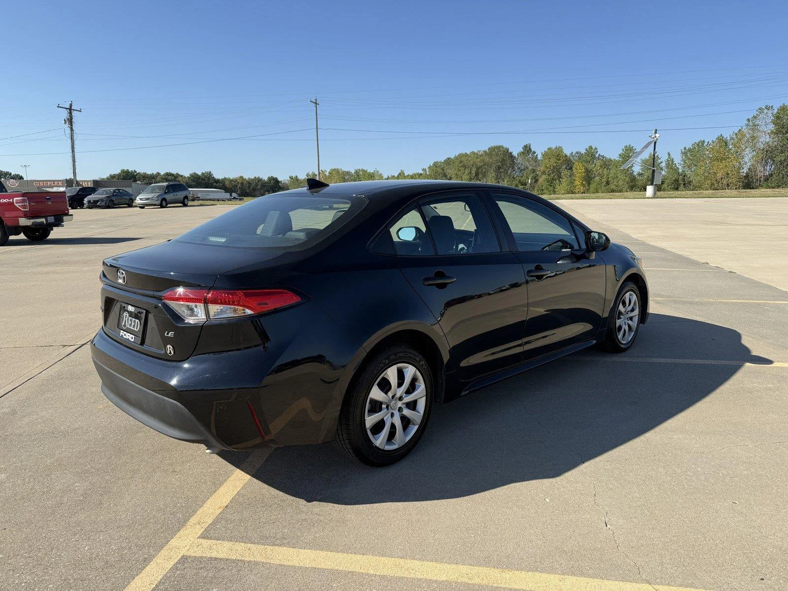 Certified Used 2025 Midnight Black Metallic Toyota LE image 9