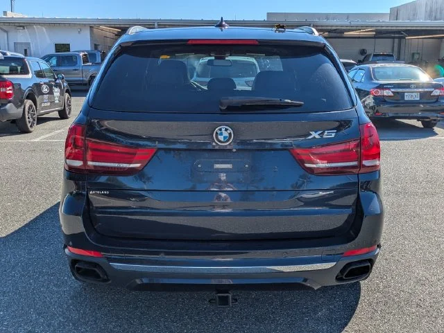 Used 2016 Blue BMW xDrive50i image 4