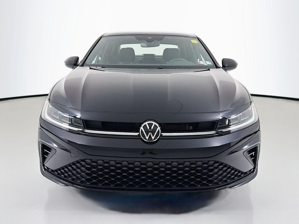 Used 2025 Deep Black Pearl Volkswagen Sport Automatic image 2