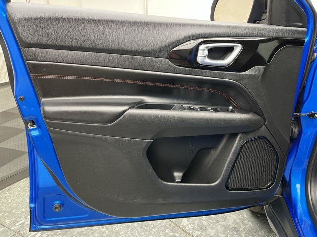 Used 2023 Laser Blue Pearlcoat Jeep Trailhawk image 6