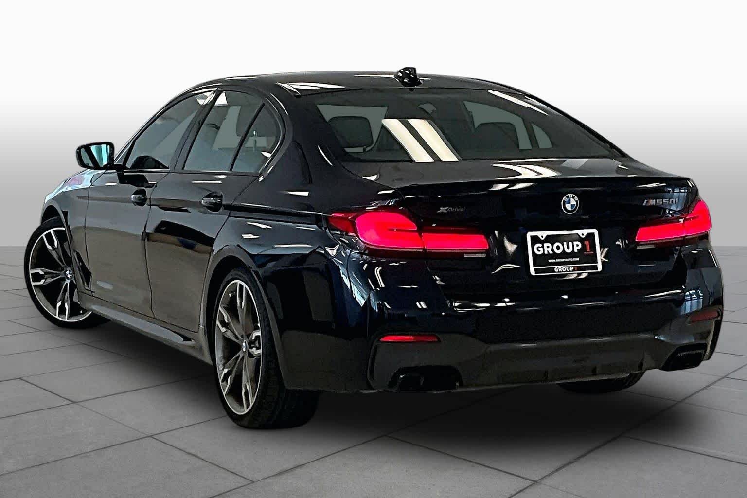 Used 2023 Carbon Black Metallic BMW M550i xDrive image 11