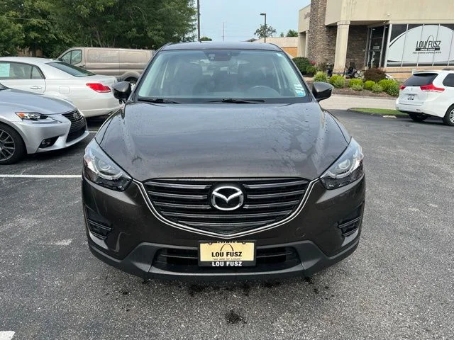 Used 2016 Mazda CX-5 Grand Touring with VIN JM3KE2DY1G0669157 for sale in Creve Coeur, MO