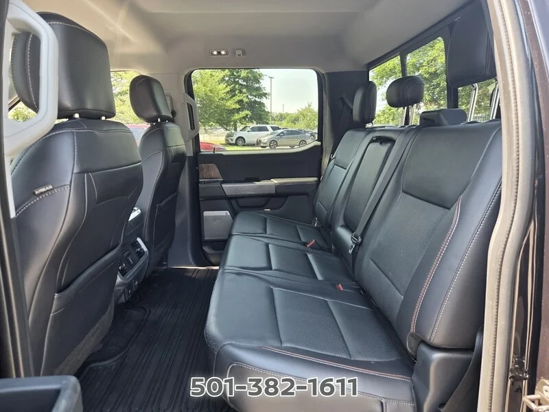 Used 2021 Black Metallic FORD LARIAT 4WD SUPERCREW 5.5