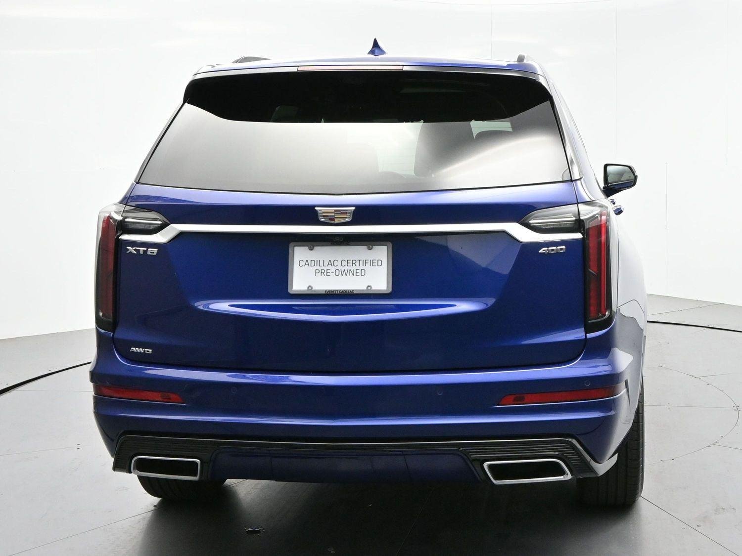 Used 2024 Opulent Blue Metallic Cadillac Sport image 6