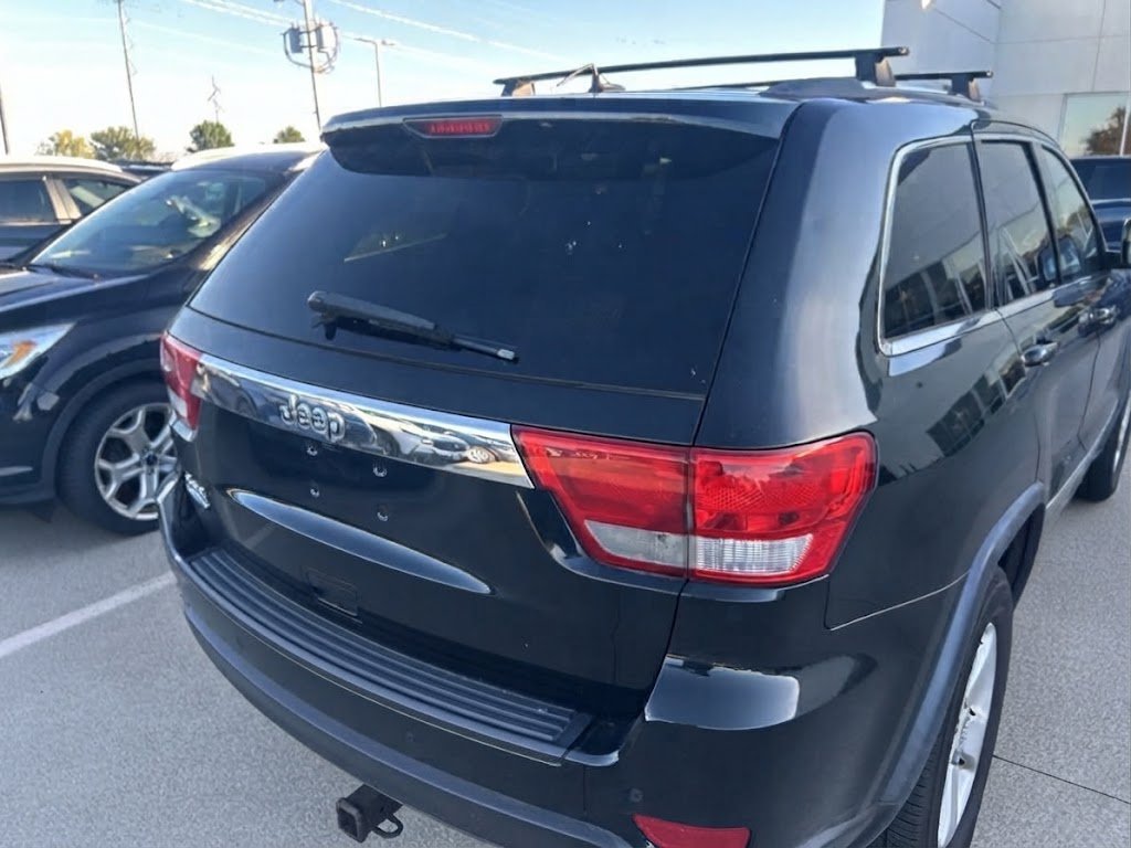 Used 2012 Black Forest Green Pearlcoat Jeep Laredo image 2