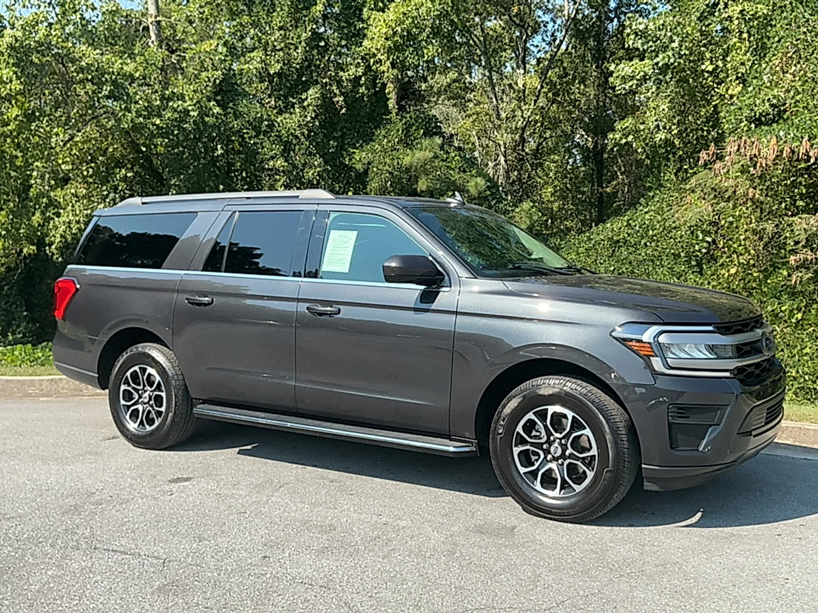 Used 2022 Dark Matter Metallic Ford XLT MAX image 1