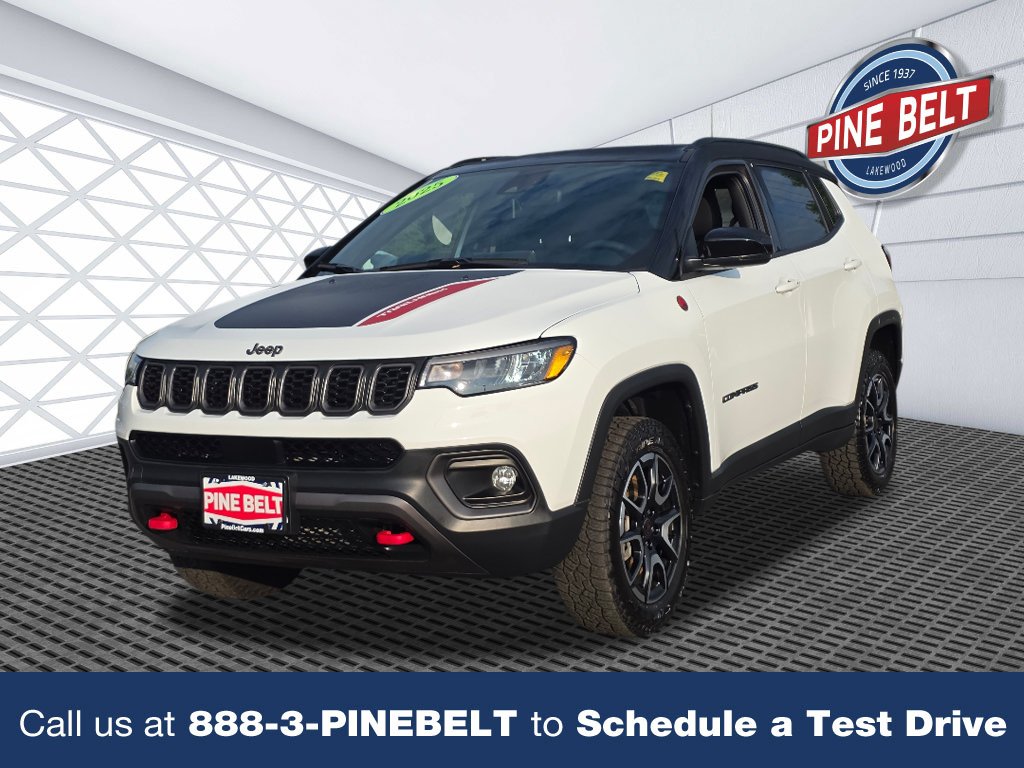 Used 2025 Bright White Clear Coat Jeep Trailhawk image 1