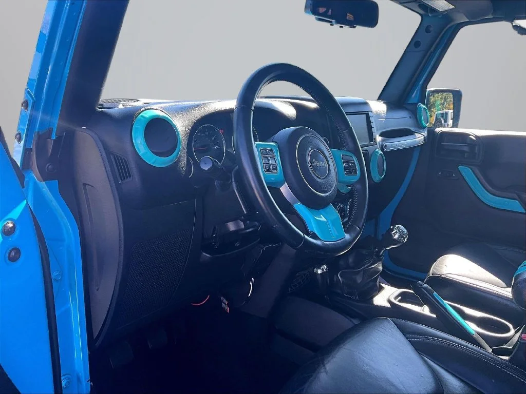 Used 2017 Blue Jeep Unlimited Sahara image 15