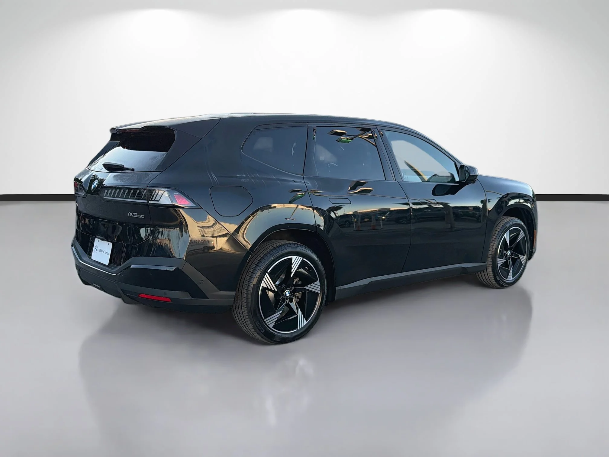 New 2027 Black Sapphire Metallic BMW 50 xDrive image 3