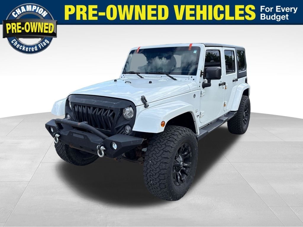 Used 2018  Jeep Unlimited Sahara image 1