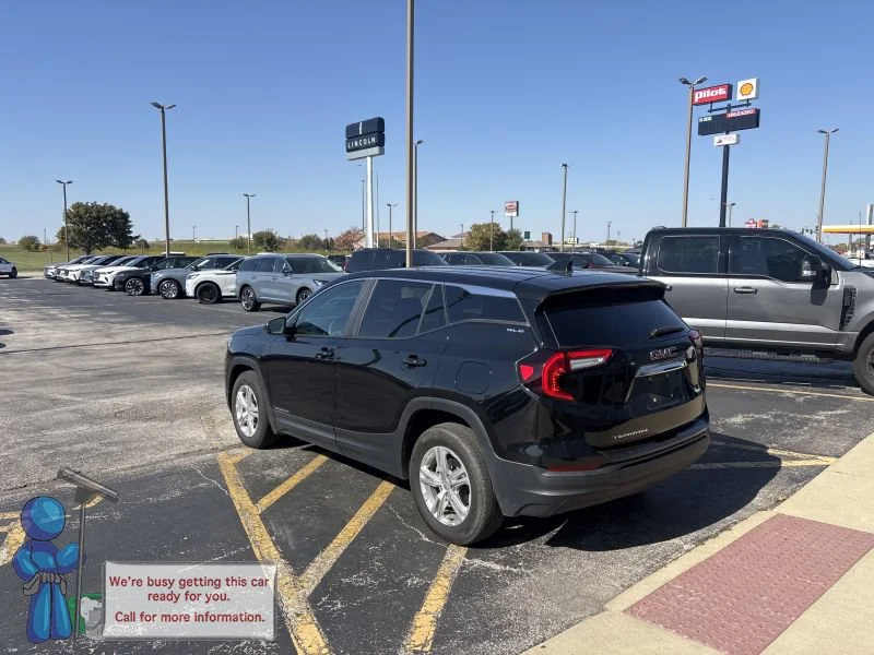 Used 2024 Ebony Twilight Metallic GMC SLE image 3