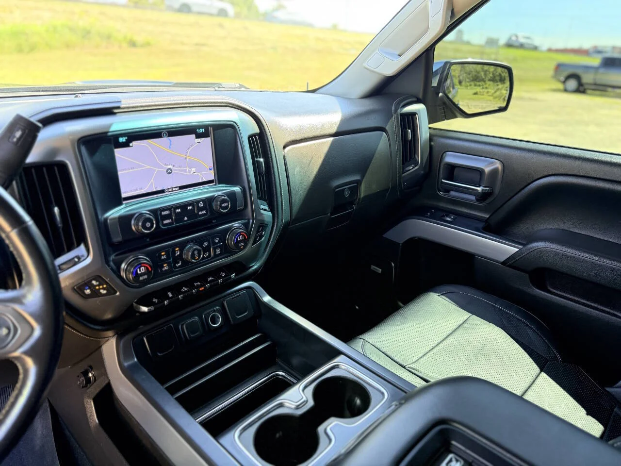 Used 2018 Black Chevrolet LTZ Z71 4x4 4dr Crew Cab 5.8 ft. SB image 16