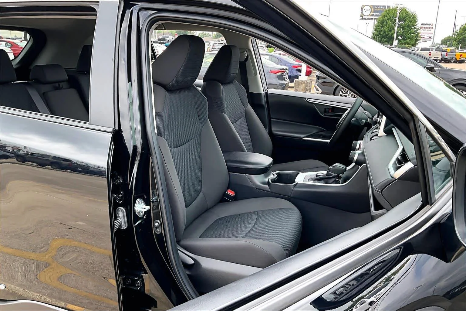 Used 2024 Midnight Black Metallic Toyota Hybrid LE image 9
