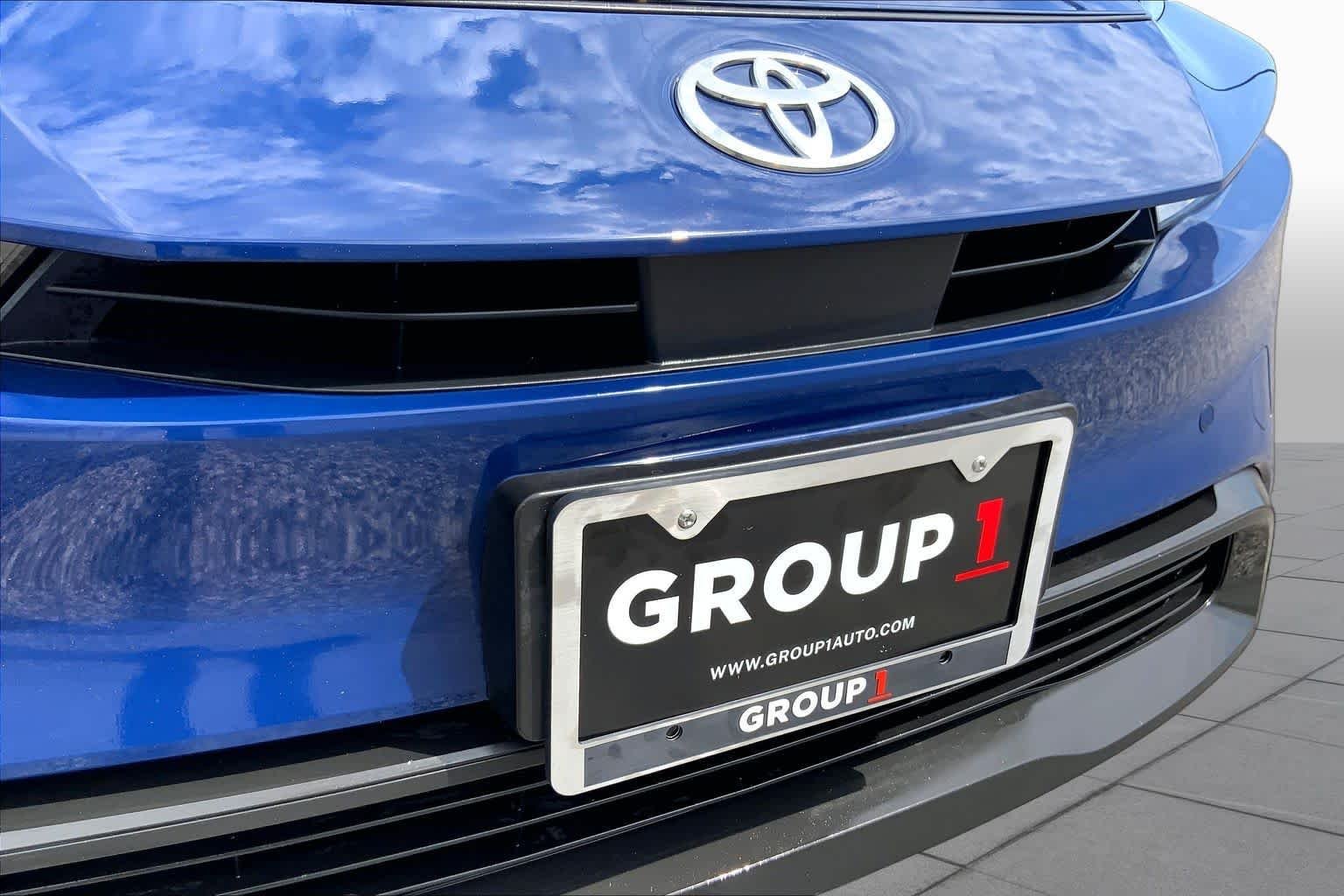 Used 2025 Reservoir Blue Toyota LE image 29