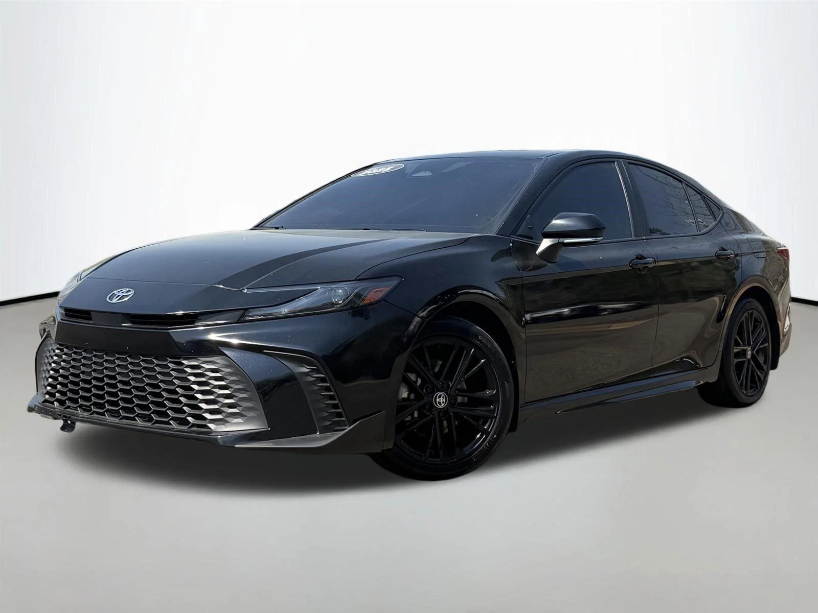 Used 2025 Midnight Black Metallic Toyota SE image 1