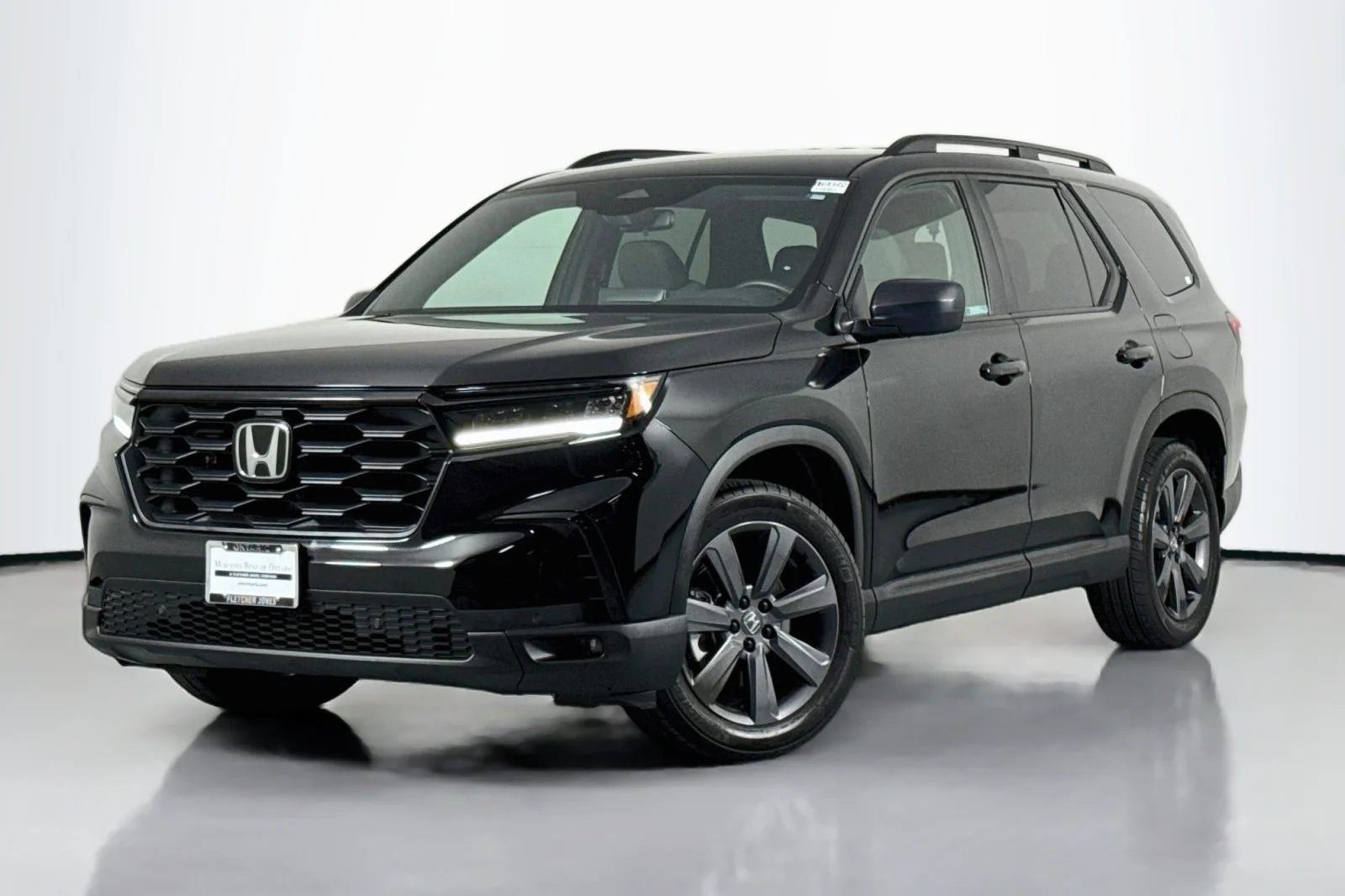 Used 2024 CRYSTAL BLACK Honda Sport AWD image 1