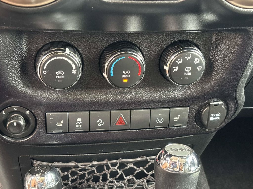 Used 2016 Black Jeep Unlimited Sahara image 21