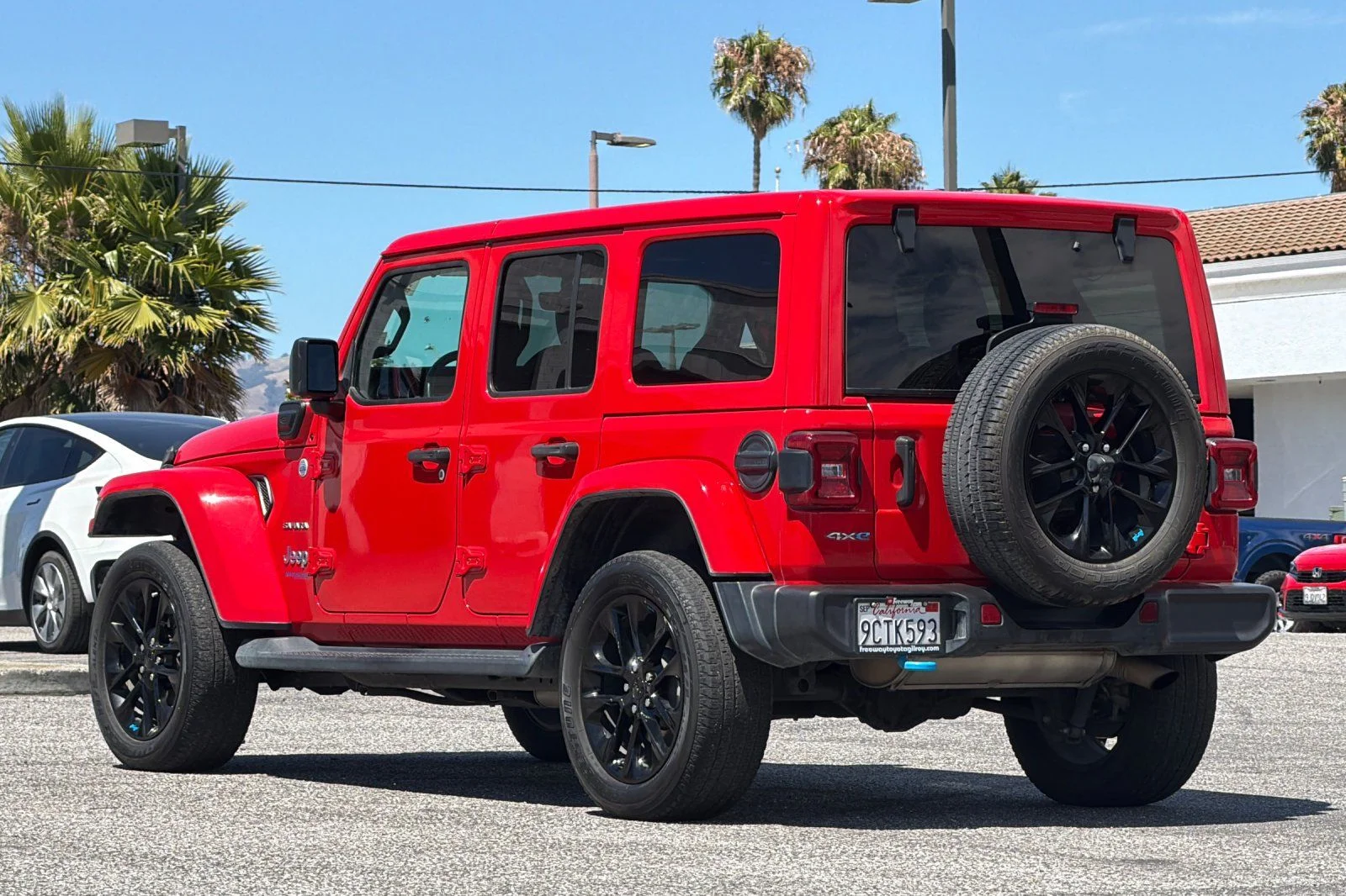Used 2022 Red Jeep Unlimited Sahara 4xe image 7