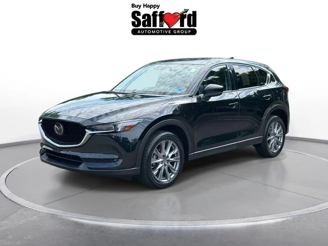 Used 2020 Black Mazda Grand Touring image 1