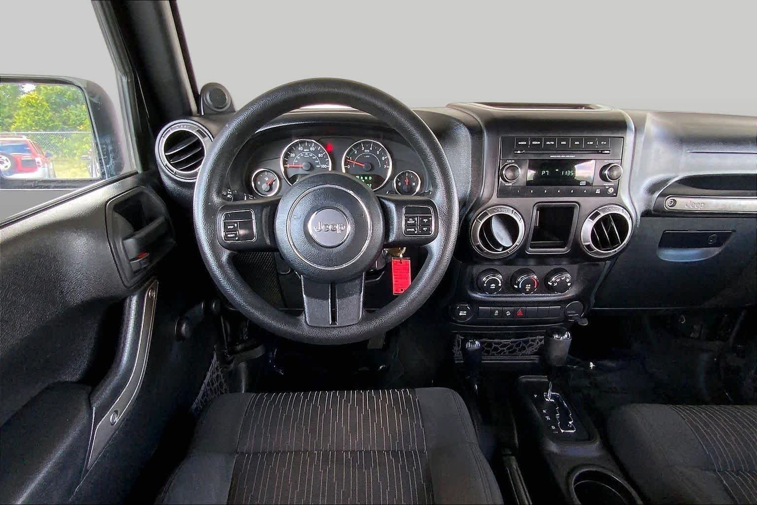 Used 2012 Black Forest Green Pearl Jeep Sport image 5