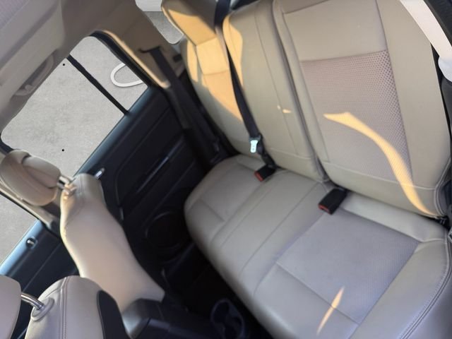 Used 2016 Granite Crystal Clearcoat Metallic Jeep Sport image 23