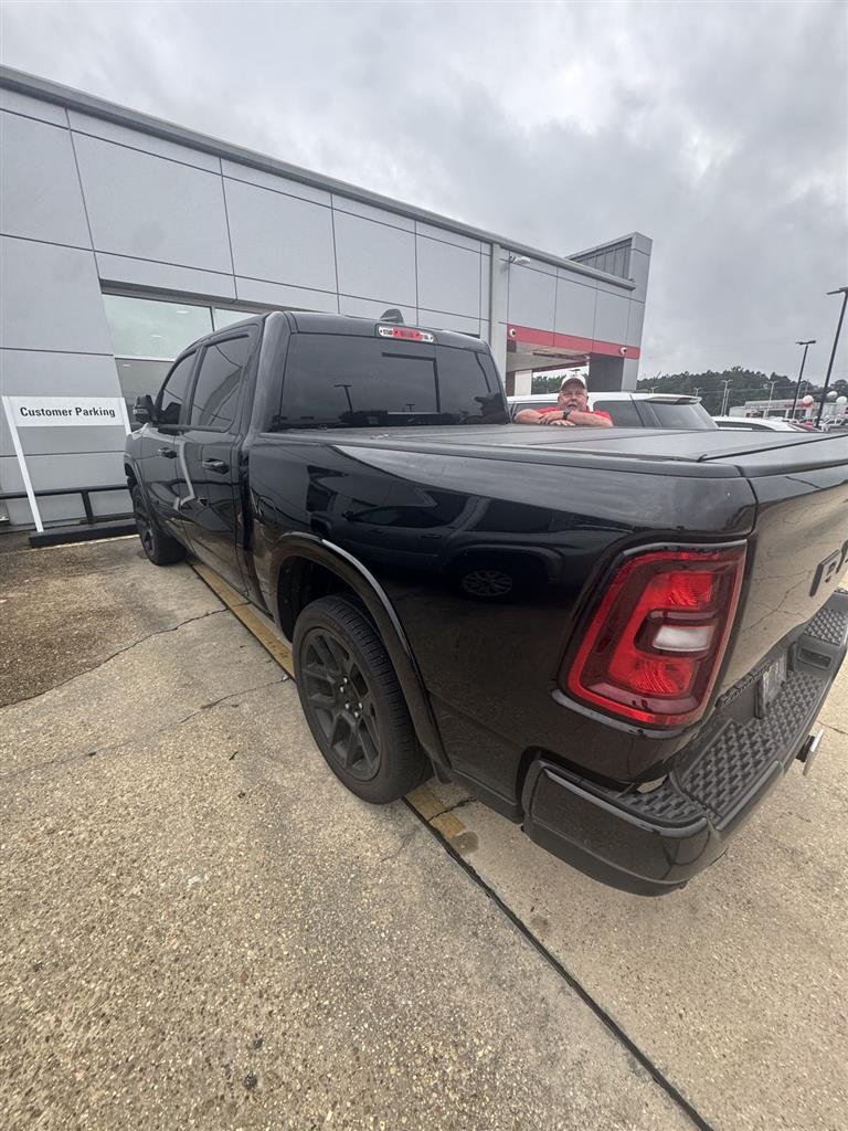 Used 2025 Diamond Black Crystal Pearlcoat Ram Laramie image 2