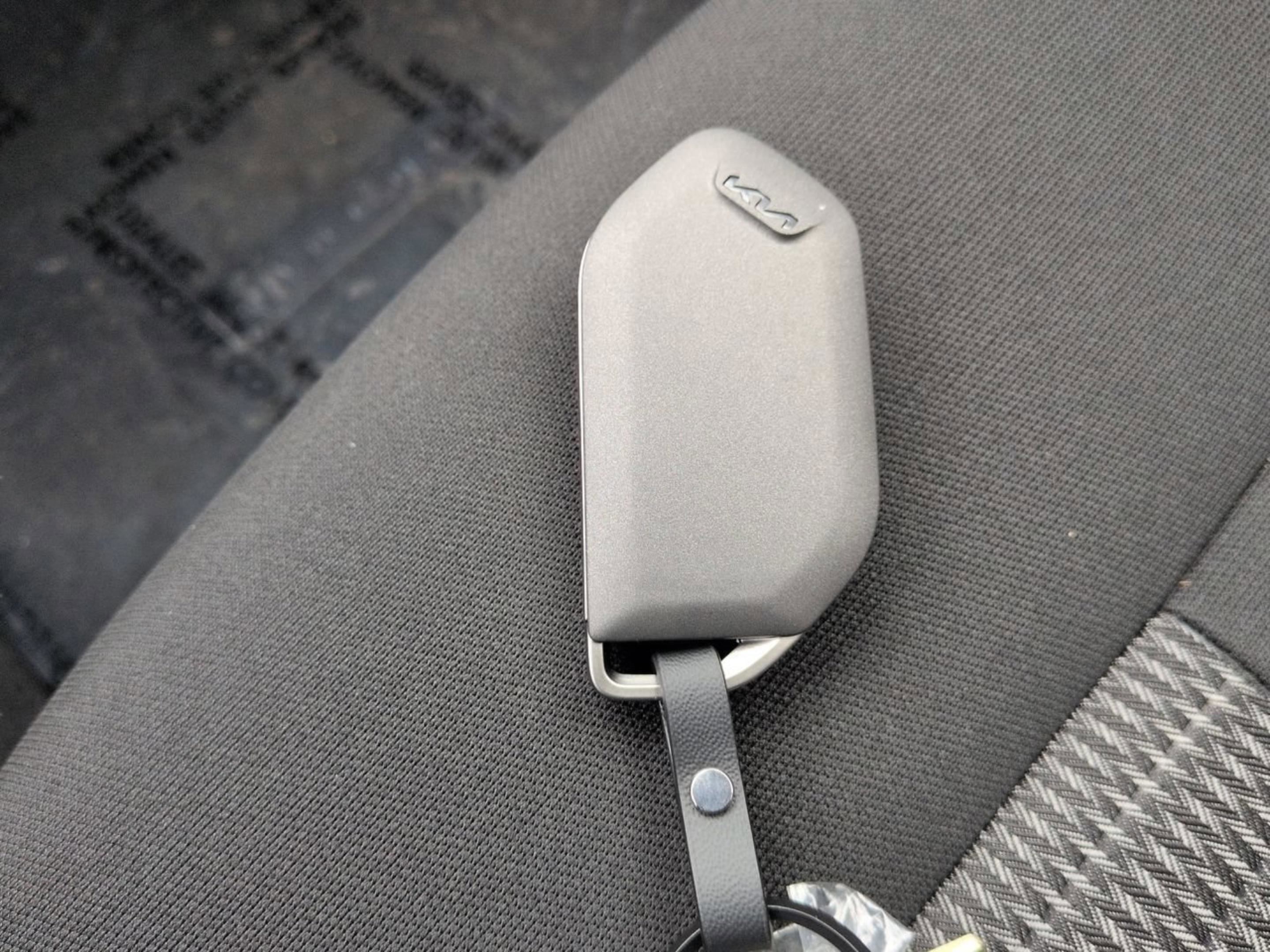 New 2026 Ivory Silver Kia LX image 32