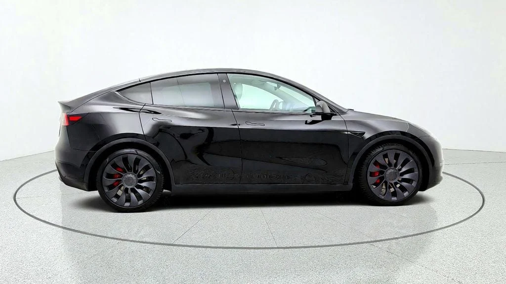 Used 2021 Solid Black Tesla Performance AWD w/ White & Black Premium Interior image 4