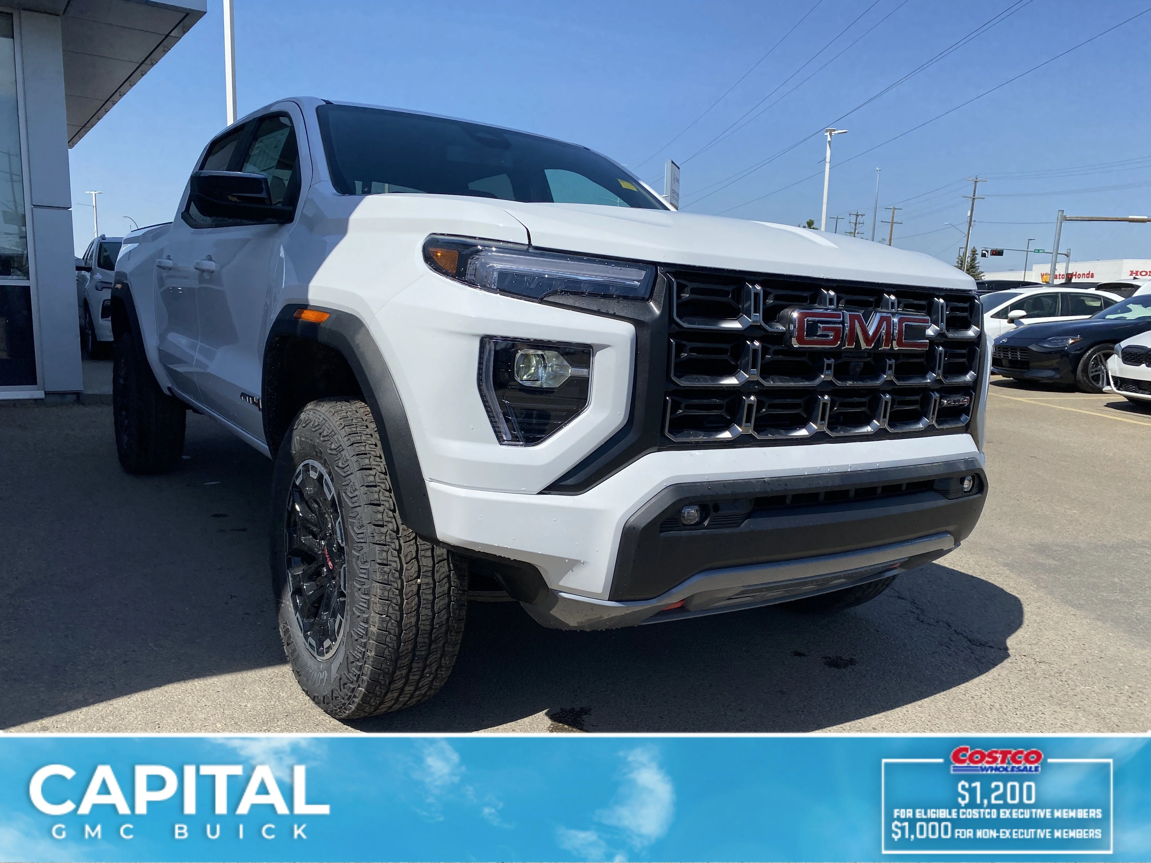 New 2026 Summit White GMC 4WD AT4 image 7