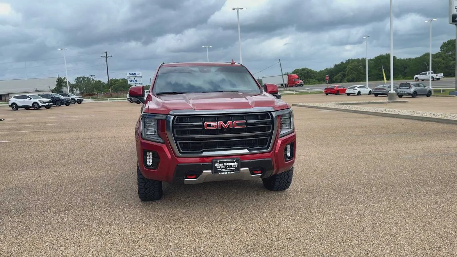 Used 2024 Volcanic Red Tintcoat GMC AT4 image 3